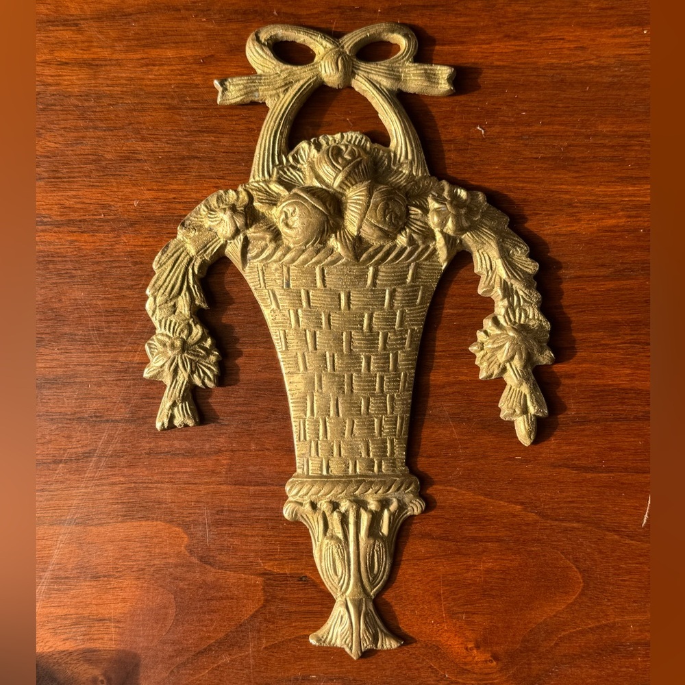 Vintage brass wall plaque decorated of Flowers in a basket